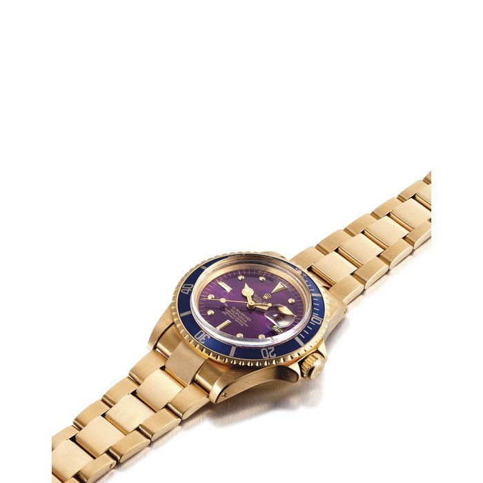 Rolex ROLEX. A FINE AND VERY RARE 18K GOLD AUTOMATIC WRISTWATCH WITH SWEEP CENTRE SECONDS, DATE, BRACELET AND PURPLE NIPPLE DIAL SIGNED ROLEX, OYSTER PERPETUAL DATE, SUBMARINER MODEL, REF. 1680, CASE NO. 5'861'286, CIRCA 1978