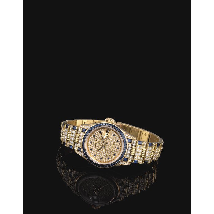 Rolex ROLEX. A LADY'S FINE AND RARE 18K GOLD DIAMOND AND SAPPHIRE-SET AUTOMATIC WRISTWATCH WITH SWEEP CENTRE SECONDS, DATE AND BRACELET SIGNED ROLEX, DATEJUST MODEL, REF. 69028, NO. 102, CASE NO. 8'899'321, CIRCA 1985