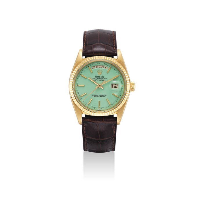 Rolex ROLEX. A FINE AND VERY RARE 18K GOLD AUTOMATIC WRISTWATCH WITH SWEEP CENTRE SECONDS, DAY, DATE, BRACELET AND PISTACHIO LACQUERED DIAL SIGNED ROLEX, OYSTER PERPETUAL, DAY-DATE MODEL, REF. 1803, CASE NO. 3'392'356, CIRCA 1972
