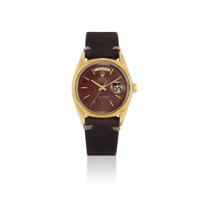 Rolex ROLEX. A RARE AND ATTRACTIVE 18K GOLD AUTOMATIC WRISTWATCH WITH SWEEP CENTRE SECONDS, DAY, DATE, HACK FEATURE AND OXBLOOD LACQUERED DIAL SIGNED ROLEX, OYSTER PERPETUAL, DAY-DATE, REF. 1811/1803, CASE NO. 2'643'988, CIRCA 1970