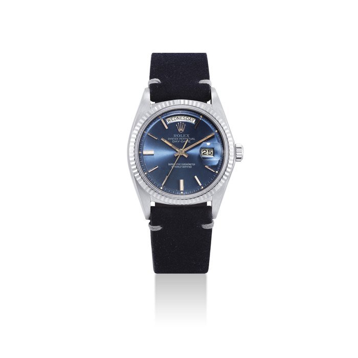 Rolex ROLEX. A FINE 18K WHITE GOLD AUTOMATIC WRISTWATCH WITH SWEEP CENTRE SECONDS, DAY, DATE AND HACK FEATURE SIGNED ROLEX, OYSTER PERPETUAL, DAY-DATE MODEL, REF. 1803, CASE NO. 2'742'208, CIRCA 1971