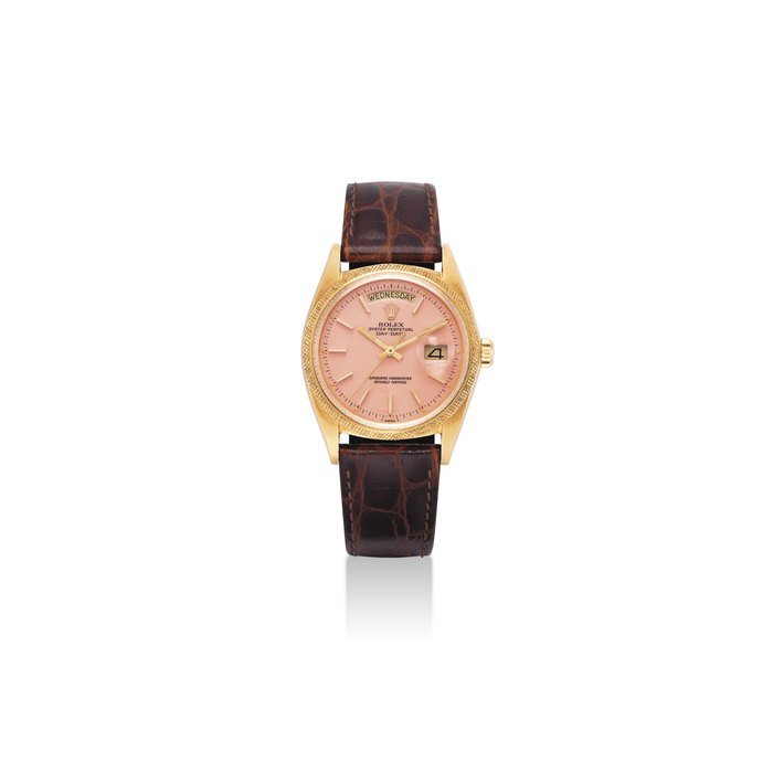 Rolex ROLEX. A FINE AND VERY RARE 18K GOLD AUTOMATIC WRISTWATCH WITH SWEEP CENTRE SECONDS, DAY, DATE AND SALMON LACQUERED DIAL SIGNED ROLEX, OYSTER PERPETUAL, DAY-DATE MODEL, REF. 1811/1803, CASE NO. 2'919'175, CIRCA 1971