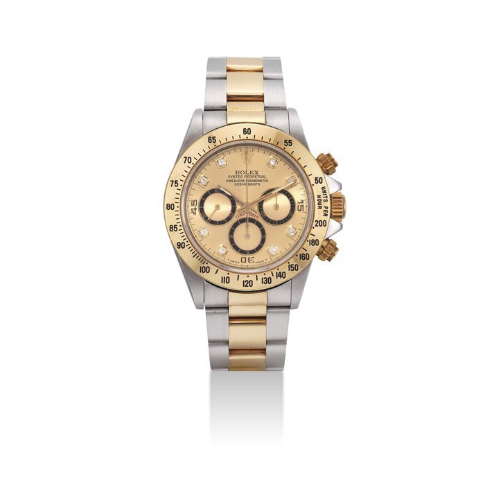 Rolex ROLEX. A STAINLESS STEEL, GOLD AND DIAMOND-SET AUTOMATIC CHRONOGRAPH WRISTWATCH WITH BRACELET SIGNED ROLEX, OYSTER PERPETUAL, COSMOGRAPH DAYTONA MODEL, REF. 16523, CASE NO. L244132, CIRCA 1989