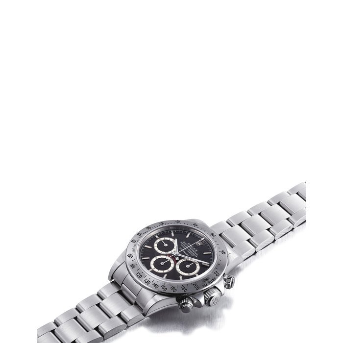 Rolex ROLEX. A STAINLESS STEEL AUTOMATIC CHRONOGRAPH WRISTWATCH WITH BRACELET SIGNED ROLEX, OYSTER PERPETUAL, COSMOGRAPH DAYTONA MODEL, REF. 16520, CASE NO. R884458, CIRCA 1988