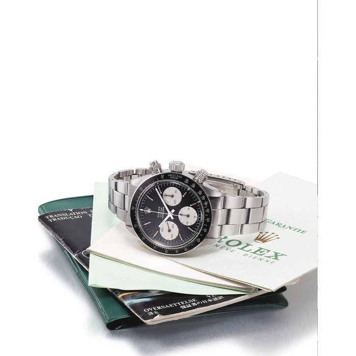 Rolex ROLEX. A RARE STAINLESS STEEL CHRONOGRAPH WRISTWATCH WITH BRACELET SIGNED ROLEX, OYSTER COSMOGRAPH, REF. 6263/6265, CASE NO. 3'590'445, CIRCA 1973 · 6263/6265
