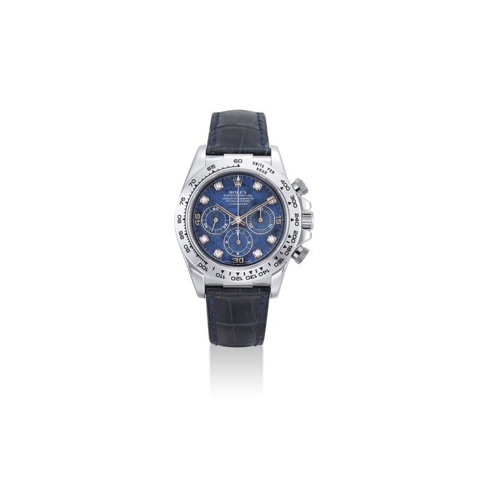 Rolex ROLEX. A FINE AND RARE 18K WHITE GOLD AND DIAMOND-SET AUTOMATIC CHRONOGRAPH WRISTWATCH WITH SODALITE DIAL SIGNED ROLEX, OYSTER PERPETUAL, COSMOGRAPH DAYTONA MODEL, REF. 16519, CASE NO. A882342, CIRCA 2000
