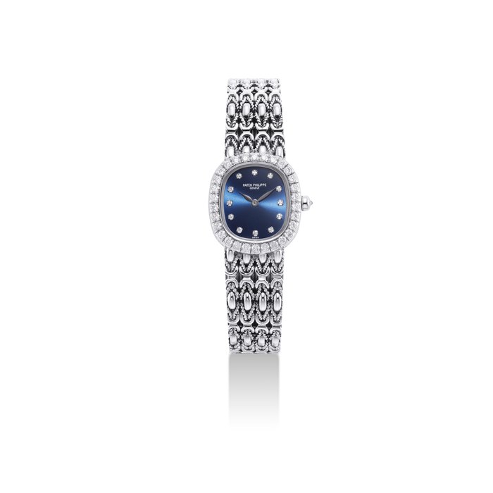 Patek Philippe PATEK PHILIPPE. A LADY'S FINE 18K WHITE GOLD AND DIAMOND-SET CUSHION-SHAPED BRACELET WATCH SIGNED PATEK PHILIPPE, GENEVE, ELLIPSE MODEL, REF. 4941, MOVEMENT NO. 3'307'188, CASE NO. 4'229'034, MANUFACTURED IN 2004, Price & Market Data