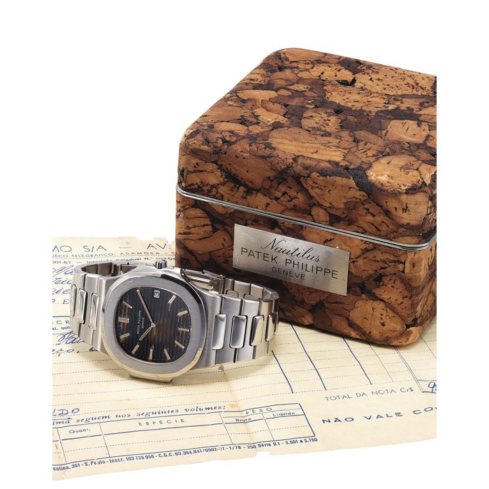 PATEK PHILIPPE. A LARGE AND RARE STAINLESS STEEL AUTOMATIC WRISTWATCH WITH DATE AND BRACELET SIGNED PATEK PHILIPPE, GENEVE, NAUTILUS MODEL, REF. 3700/1, MOVEMENT NO. 1'306'164, CASE NO. 536'952, MANUFACTURED IN 1977