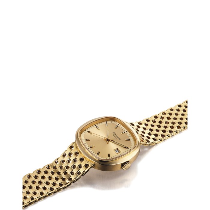 PATEK PHILIPPE. A RARE OVERSIZED 18K GOLD CUSHION-SHAPED ELECTRONIC BRACELET WATCH WITH SWEEP CENTRE SECONDS AND DATE SIGNED PATEK PHILIPPE, GENEVE, REF. 3587/2, MOVEMENT NO. 5'865, CASE NO. 2'699'698, MANUFACTURED IN 1971