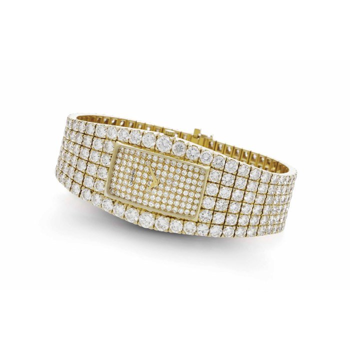 Vacheron Constantin And Cartier Vacheron Constantin and Cartier. A Rare Large and Impressive 18k Gold and Diamond-set Bracelet Watch with Certificate of Authenticity SIGNED VACHERON CONSTANTIN, RETAILED BY CARTIER, REF. NO. 35707/708, MOVEMENT NO. 660'675, CASE NO. 528'188, MANUFACTURED IN 1978