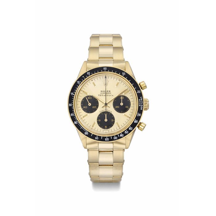 Rolex Rolex. A highly exclusive and attractive 14K gold chronograph wristwatch with champagne dial, bracelet and brown subsidiary dials SIGNED ROLEX, COSMOGRAPH, DAYTONA, RETAILED BY TIFFANY & CO., REF. 6264, CASE NO. 2'802'738, MANUFACTURED IN 1971