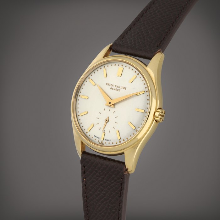Patek Philippe Calatrava, 'Double Swiss' Reference 2526 | A yellow gold wristwatch with a first series enamel dial | Circa 1954