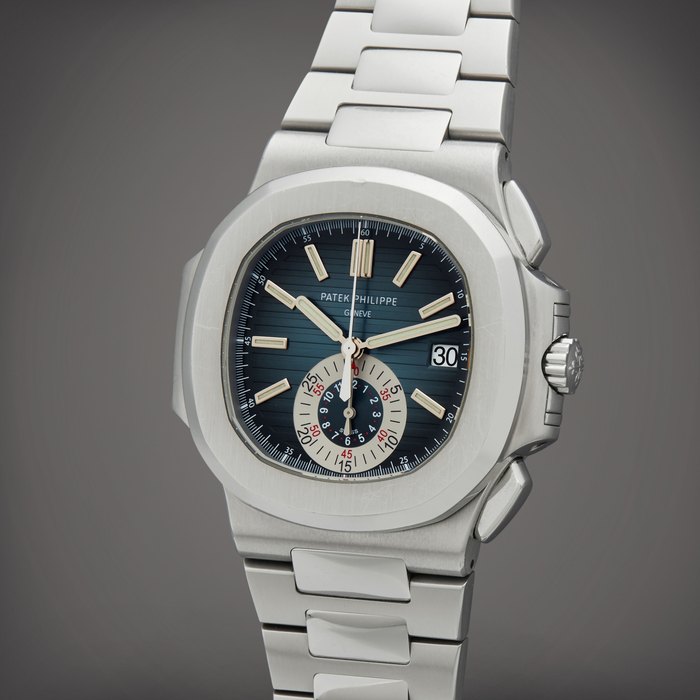 Patek Philippe Reference 5980/1A-001 Nautilus | A stainless steel flyback chronograph bracelet watch with date, Circa 2011