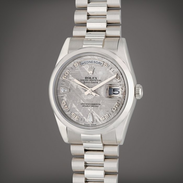 Rolex Reference 118206 Day Date | A platinum and diamond-set automatic wristwatch with day, date, and meteorite dial, Circa 2006