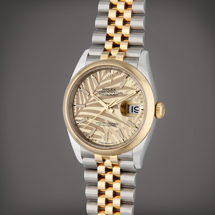 Rolex Reference 126203 Datejust | A stainless steel and yellow gold automatic wristwatch with date, bracelet, and palm motif dial, Circa 2021