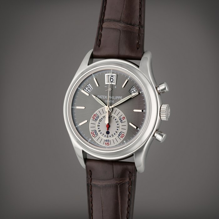 Patek Philippe Reference 5960P | A platinum automatic annual calendar flyback chronograph wristwatch with power reserve and day/night indication, Made in 2011