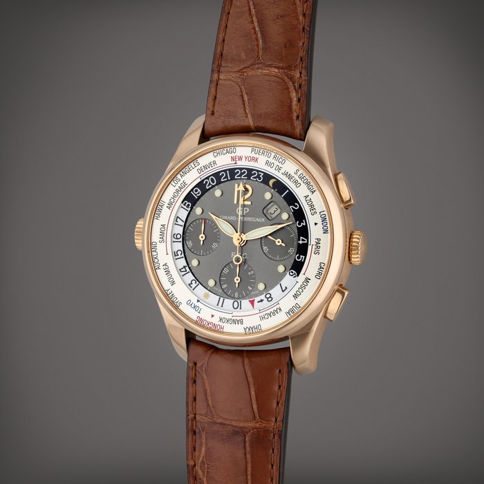 Girard-Perregaux Reference 49805 WW.TC | A pink gold automatic world time chronograph wristwatch with date, Circa 2010