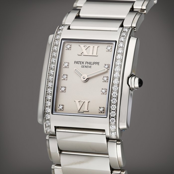 Patek Philippe Reference 4910/10A-011 Twenty-4 | A stainless steel and diamond-set wristwatch with bracelet, Circa 2015