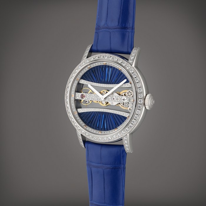 Corum Reference 05.0089 Golden Bridge Round | A white gold and diamond-set skeletonized wristwatch, Circa 2020