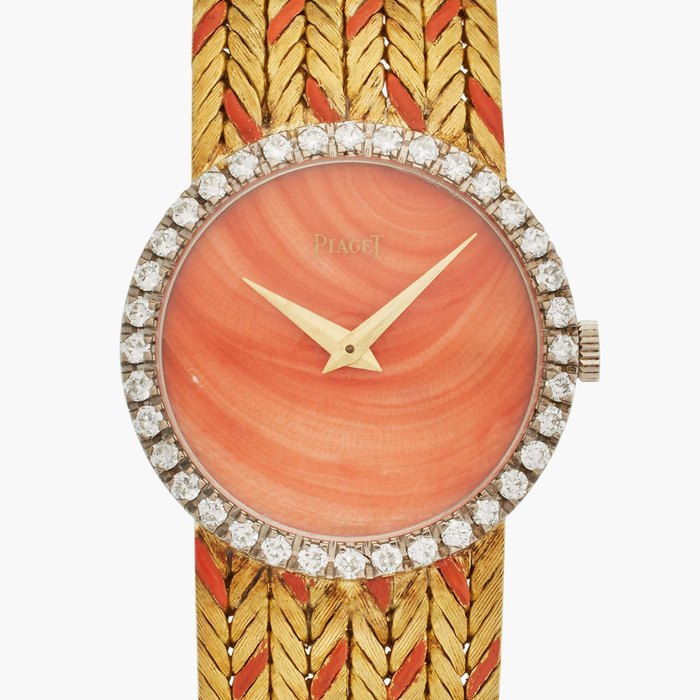 Piaget Reference 9706 E12 | A yellow gold and diamond-set bracelet watch with coral dial, Circa 1967