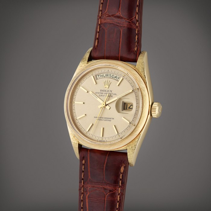 Rolex Reference 1806 Day-Date ‘Florentine’ | A yellow gold automatic wristwatch with day, date, and textured linen etched case, Circa 1960