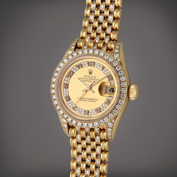 Rolex Reference 69158 Lady DateJust | A yellow gold and diamond-set automatic wristwatch with date and bracelet, Circa 1995