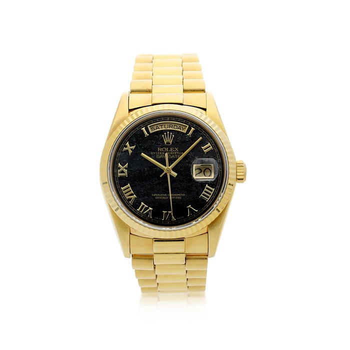 Rolex Reference 18038 Day-Date  A yellow gold automatic wristwatch with day, date, ferrite hardstone dial and bracelet, Circa 1986