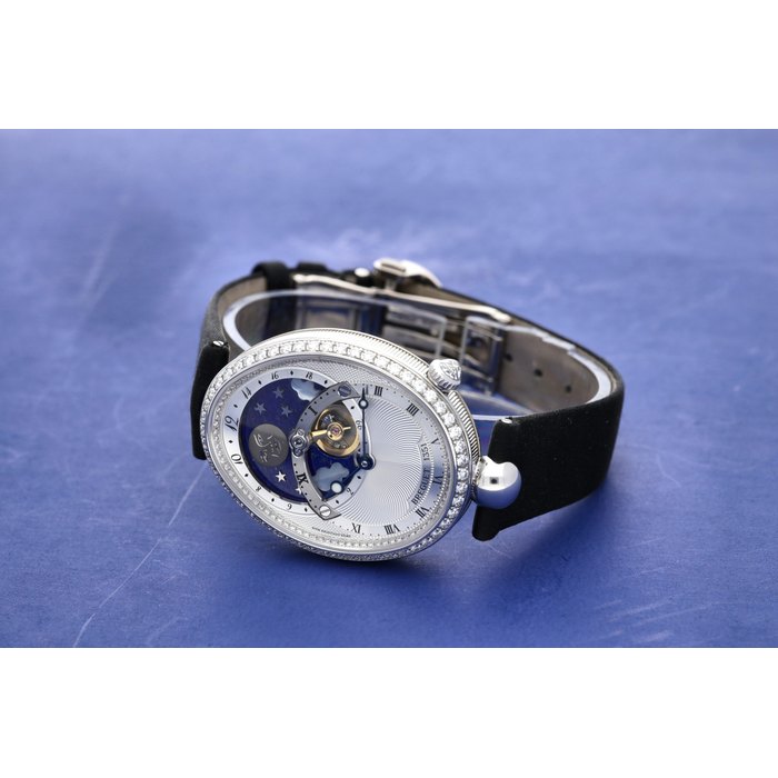 Breguet Reference 8998 Reine De Naples A white gold and diamond-set automatic oval wristwatch with moon phases and 24-hour indication, Circa 2015, Price & Market Data