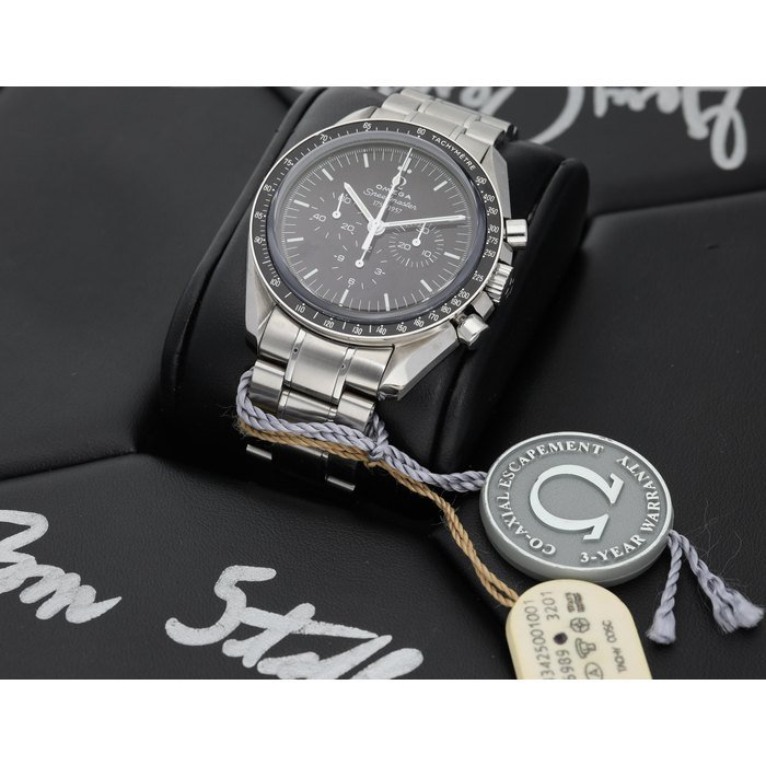 Omega Reference 311.33.42.50.01.001 | A 50th anniversary Speedmaster a limited series stainless steel chronograph wristwatch with bracelet, and presentation box autographed by astronauts Thomas P. Stafford and Gene Cernan, Circa 2007