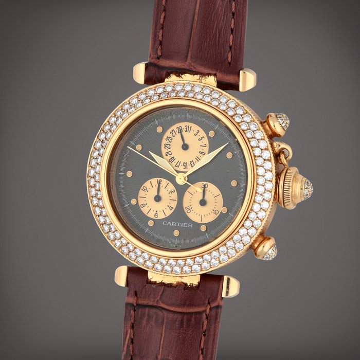 Cartier Pasha Seatimer, Reference 1353 1 | A yellow gold and diamond-set chronograph wristwatch with date | Circa 1996.