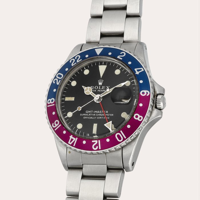 Rolex GMT-Master 'Long E', Reference 1675 | A stainless steel dual time wristwatch with date and bracelet | Circa 1966