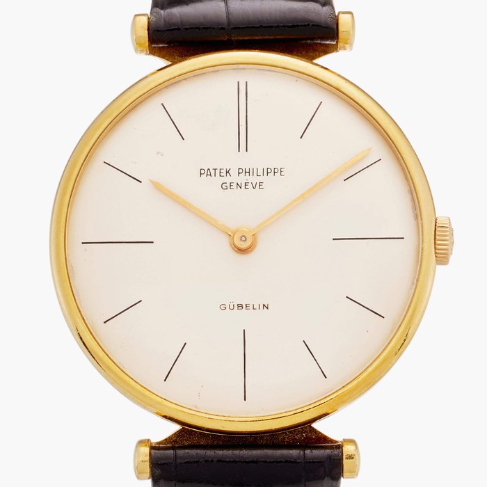 Patek Philippe Reference 2592 Calatrava | Retailed by Gübelin: A yellow gold wristwatch, Circa 1960