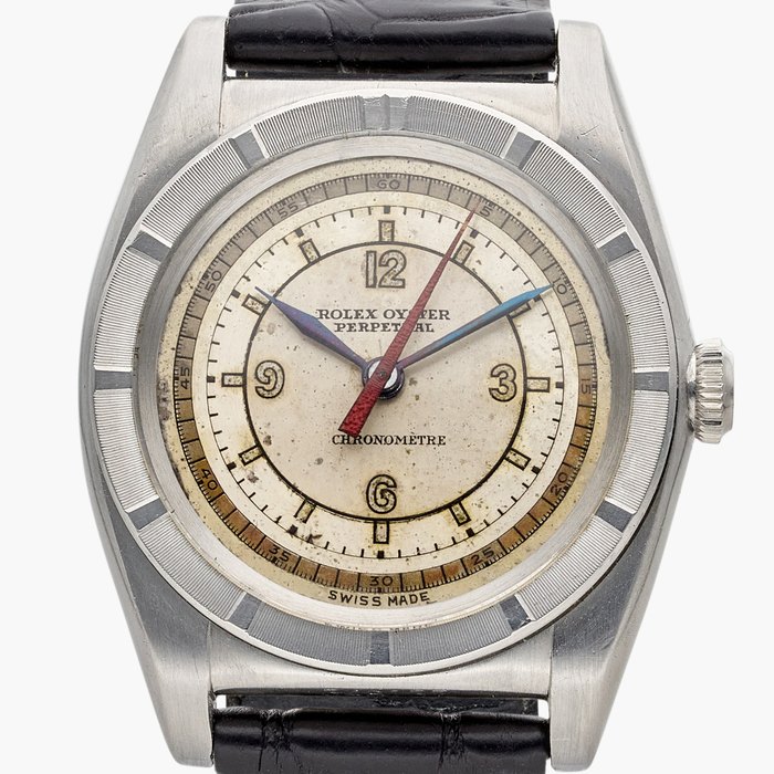 Rolex Reference 2940 'Bubbleback' | A stainless steel automatic wristwatch with sector dial and engine turn bezel, Circa 1946