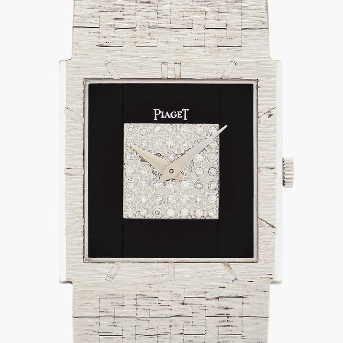 Piaget Reference 9120 AR6 | A white gold bracelet watch with onyx and diamond-set dial, Circa 1970