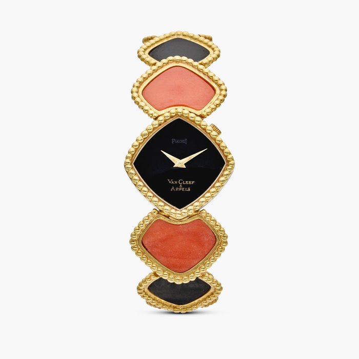 Piaget Reference 9231 N4 | Retailed by Van Cleef & Arpels: A yellow gold, onyx, and coral bracelet with with onyx dial, Circa 1970