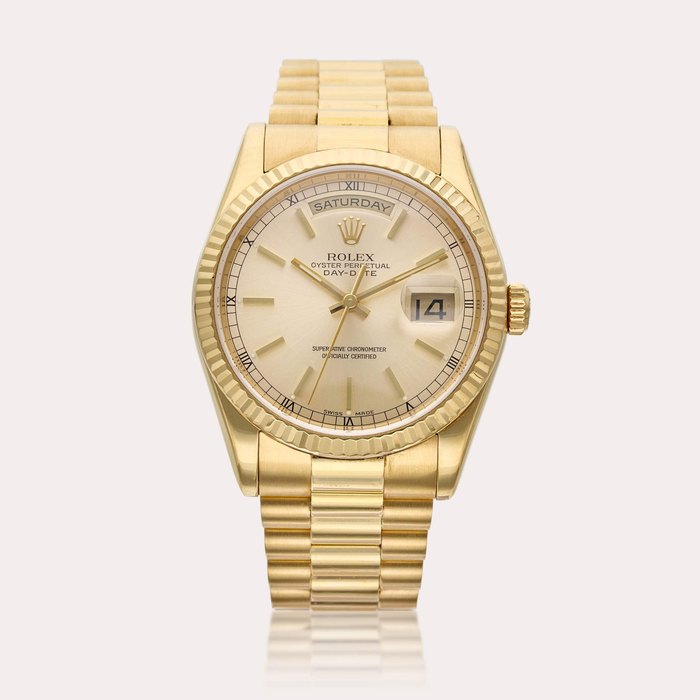 Rolex Reference 118238 Day-Date | A yellow gold automatic wristwatch with day, date and bracelet, Circa 2000