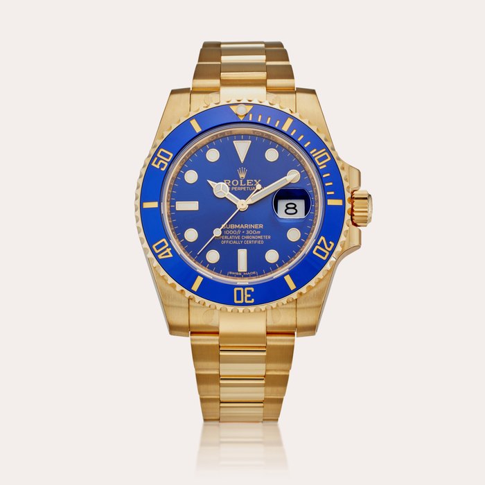 Rolex Reference 116618LB Submariner | A yellow gold automatic wristwatch with date and bracelet, Circa 2016