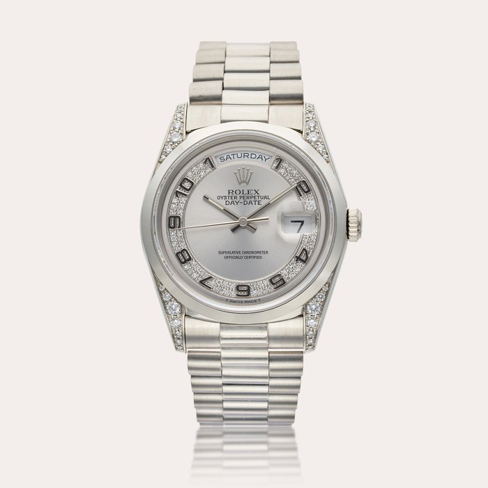 Rolex Reference 18296 Day-Date | A platinum and diamond-set automatic wristwatch with day, date and bracelet, Circa 1995