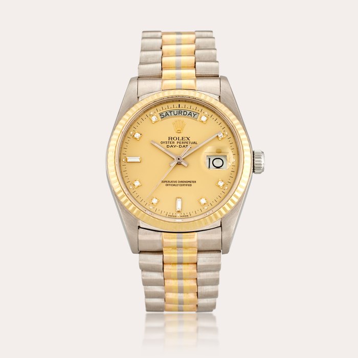 Rolex Reference 18039B Day-Date ‘Tridor’ | A yellow, pink, and white gold and diamond-set automatic wristwatch with day, date, and bracelet, Circa 1985