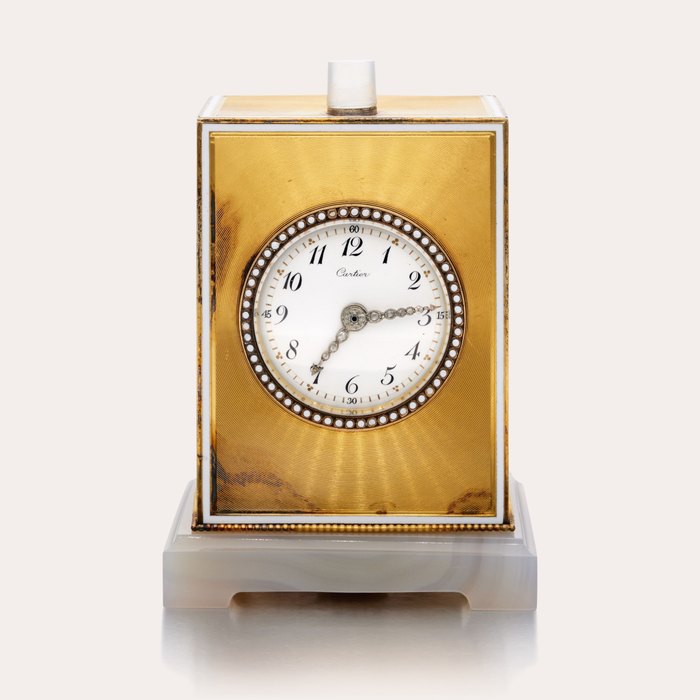 Cartier A yellow gold and enamel minute repeating desk clock, Circa 1920, Price & Market Data