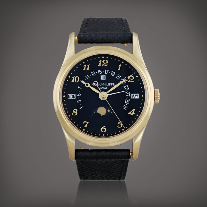 Patek Philippe Reference 5050J-024    Montre bracelet à quantième perpétuel en or jaune avec date rétrograde et phases de lune |  Yellow gold perpetual calendar wristwatch with retrograde date and moon phases    Vers 2014 |  Circa 2014