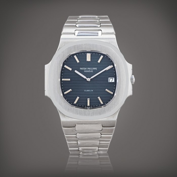 Patek Philippe Retailed by Gübelin: Nautilus 'Jumbo', reference 3700/001    Montre bracelet en acier avec date |  Stainless steel wristwatch with date and bracelet     Vers 1980 |  Circa 1980