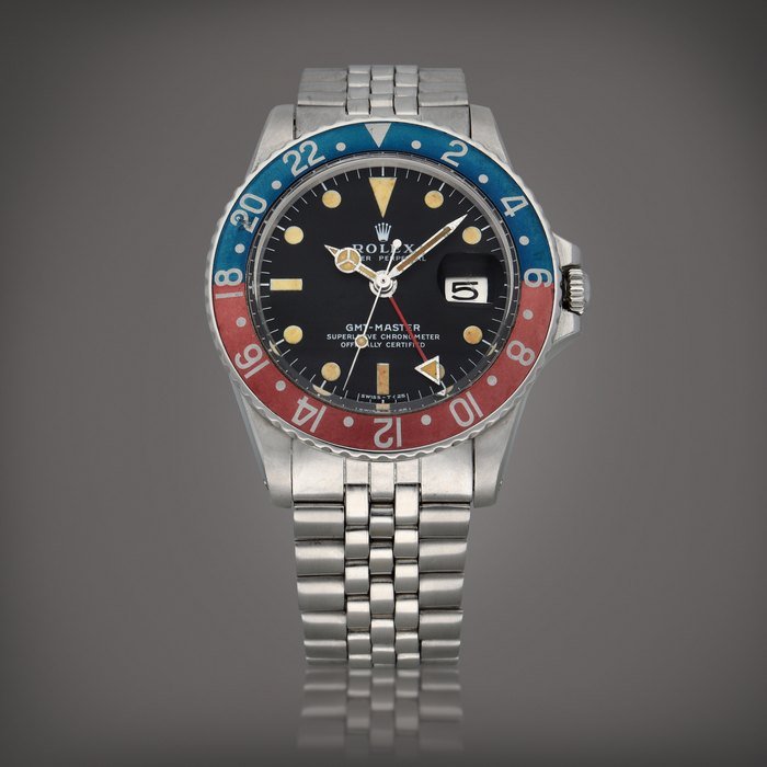 Rolex GMT-Master, Reference 1675 | A stainless steel dual time zone wristwatch with date and bracelet | Circa 1972 · 1675