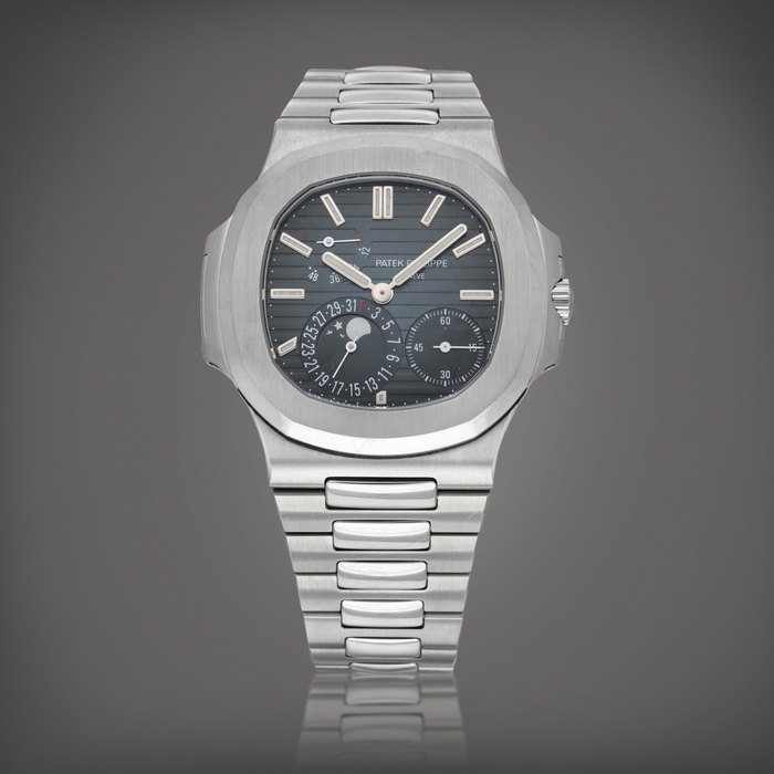 Patek Philippe Nautilus, Reference 5712/1A-001 | A stainless steel wristwatch with date, moon phases, power reserve indication and bracelet | Made in 2015