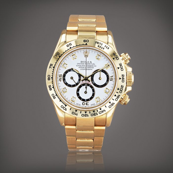 Rolex Daytona 'Inverted 6', reference 16528     Montre bracelet chronographe en or jaune et index diamant |  Yellow gold chronograph wristwatch with diamond indexes and bracelet     Vers 1993 |  Circa 1993 · 16528