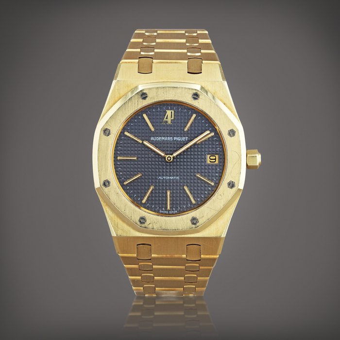 Audemars Piguet Royal Oak 'Jubilee', reference 14802BA.0.0944    Montre bracelet en or jaune avec date |  Yellow gold wristwatch with date and bracelet     Vers 1994 |  Circa 1994