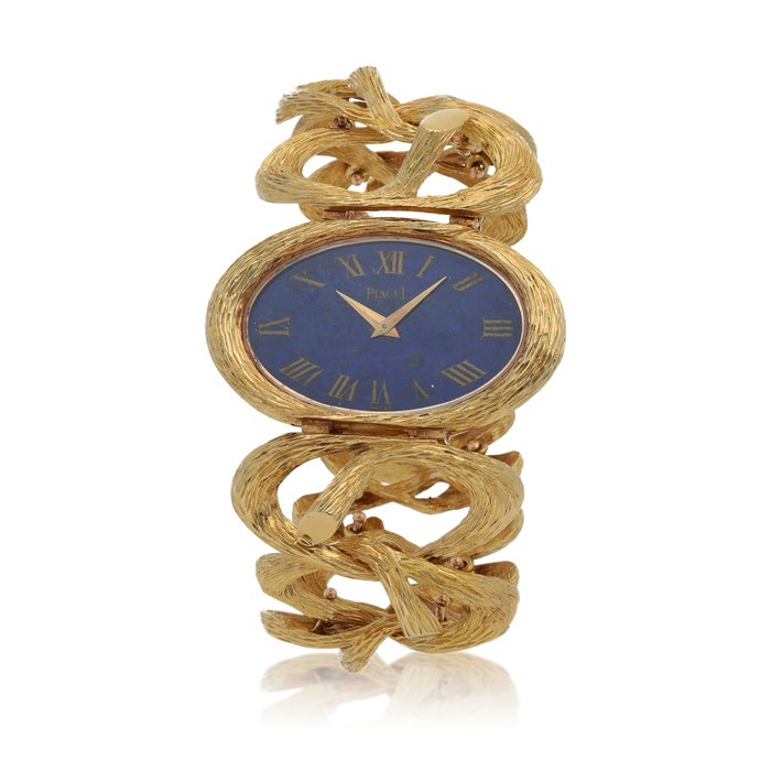 Piaget Ref. 9850 D71  Yellow gold bracelet watch with lapis lazuli dial  Circa 1970