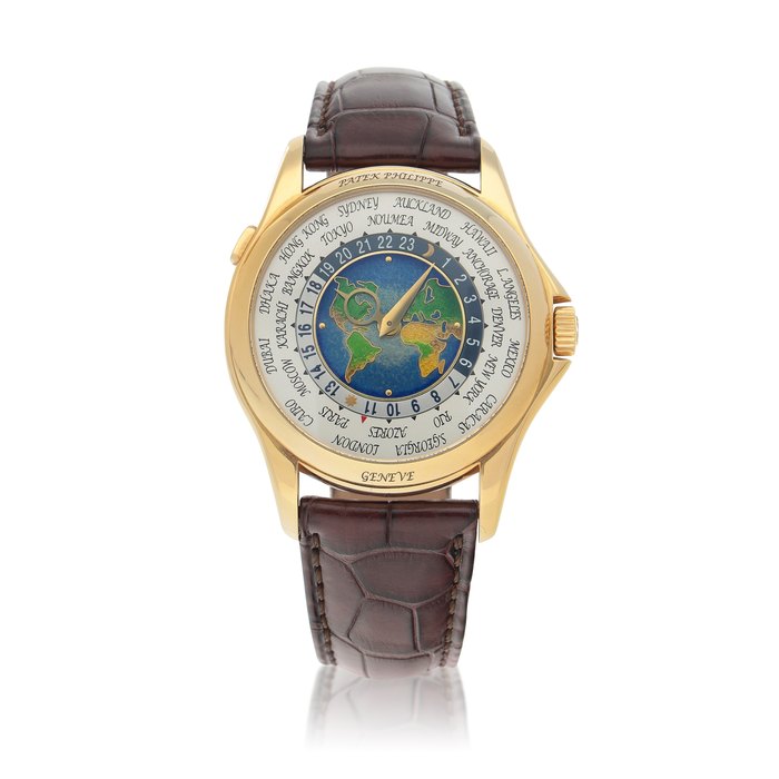 Patek Philippe 'Geneva Seal' World Time, Ref. 5131J-001  Yellow gold world time wristwatch with cloisonné enamel dial depicting a map of the Americas, Europe and Africa  Circa 2009