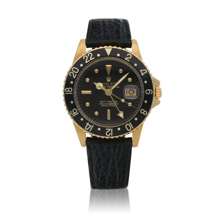 Rolex 'Nipple Dial' GMT-Master, Ref. 1675  Yellow gold dual time wristwatch with date and 'nipple' indexes  Circa 1977 · 1675