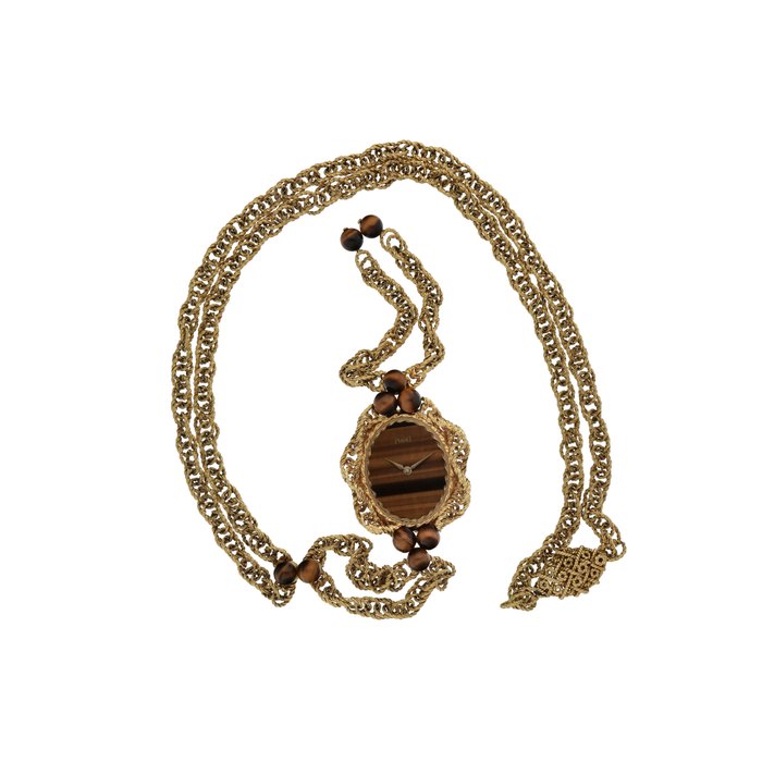 Piaget Ref. 6865P692  Yellow gold and tiger's eye sautoir watch with matching bracelet  Circa 1974